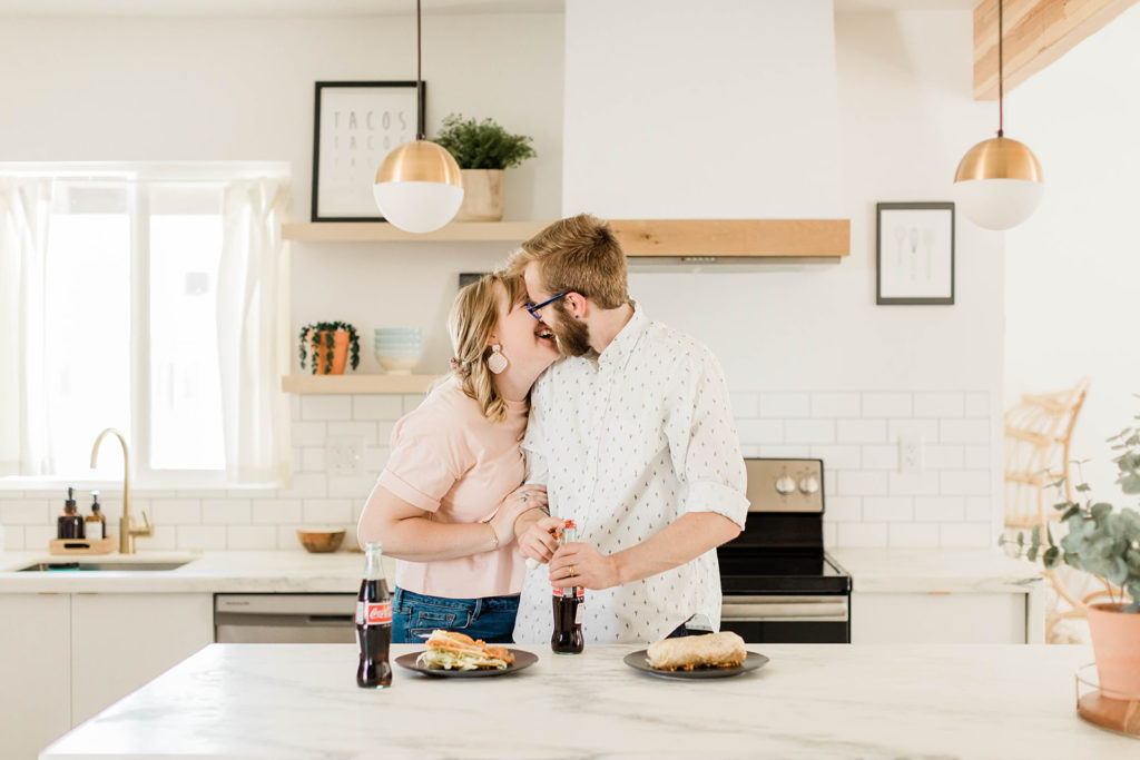 couple elevating their relationship by have at home date making lunch in the kitchen