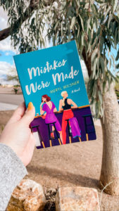 book cover of "Mistakes were made" being held in my hand