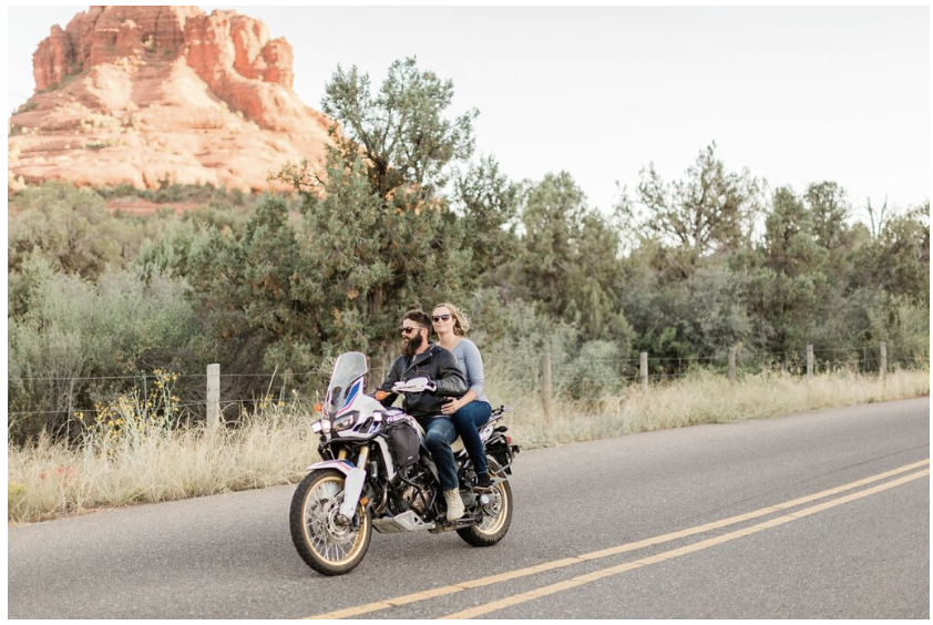 Sedona Engagement Session - couple on a motorcycle surrounded by red rocks